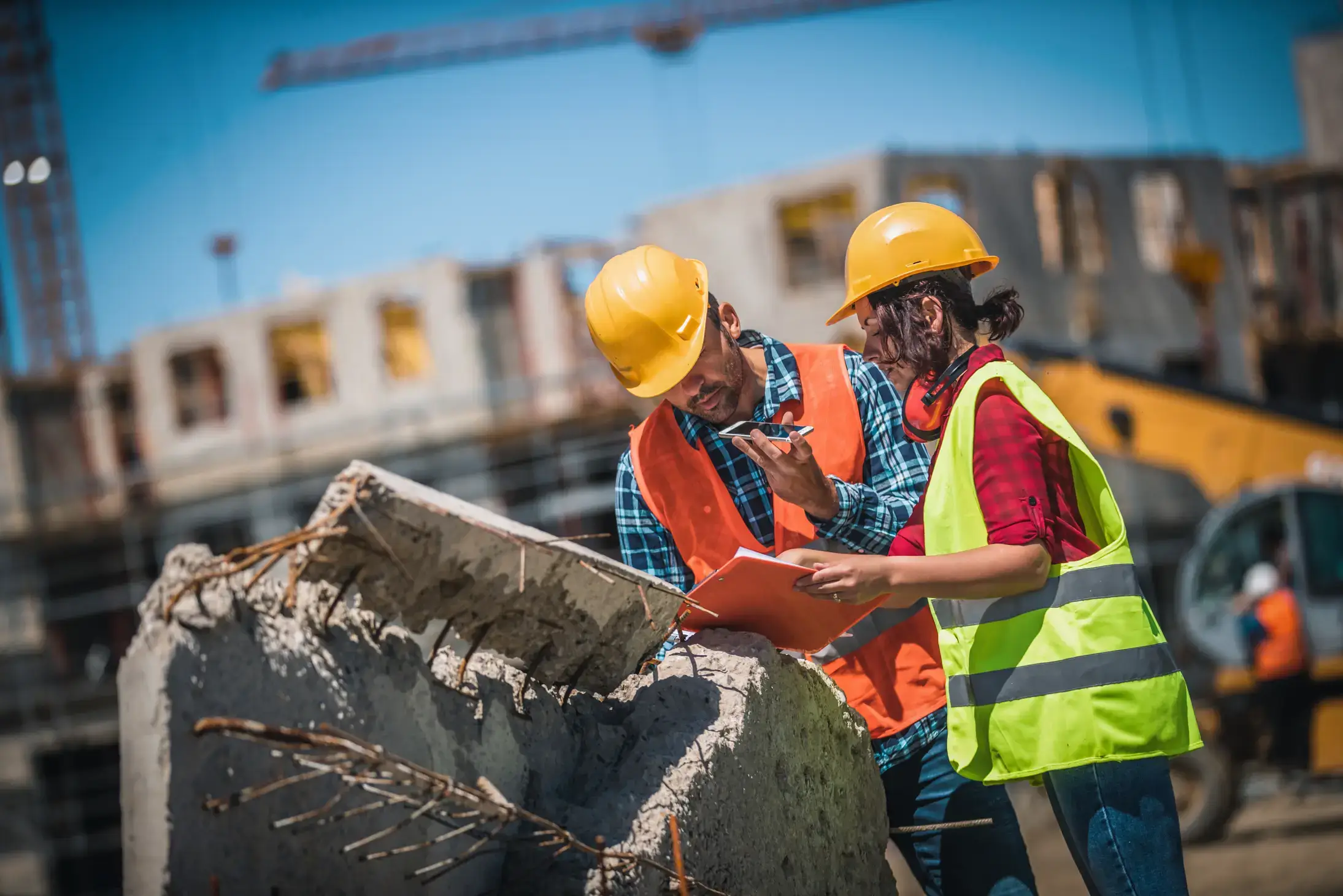 Construction site with scaffolding and engineers